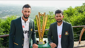 Photo: X | Pakistan Cricket : Pakistan Test captain Shan Masood (L) and Bangladesh skipper Najmul Hossain Shanto with the trophy.